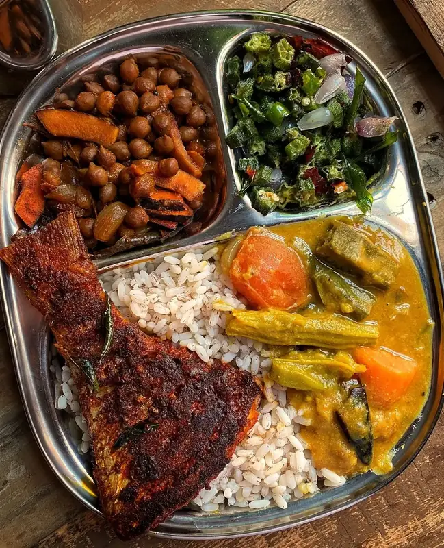 A fish thali — rice, fish and the day’s vegetables