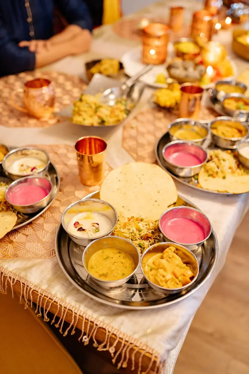 Sunday lunch at Aangan — the long table laid for a family